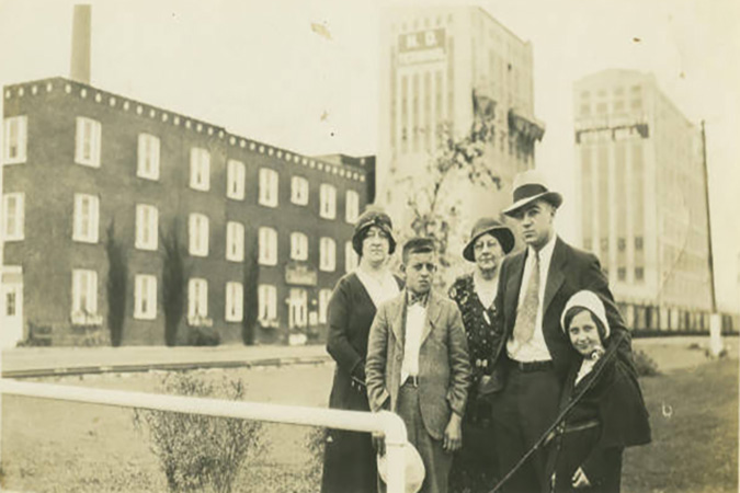 A family poses in front of the mill in 1932. Courtesy of State Historical Society of North Dakota
